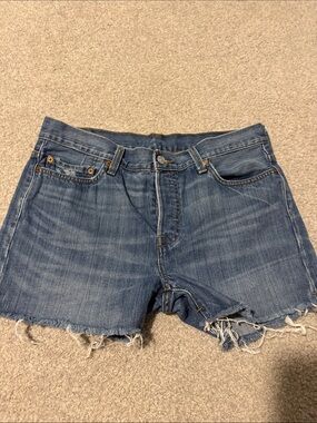 Levi's Distressed Medium Blue Denim Cutoff Shorts